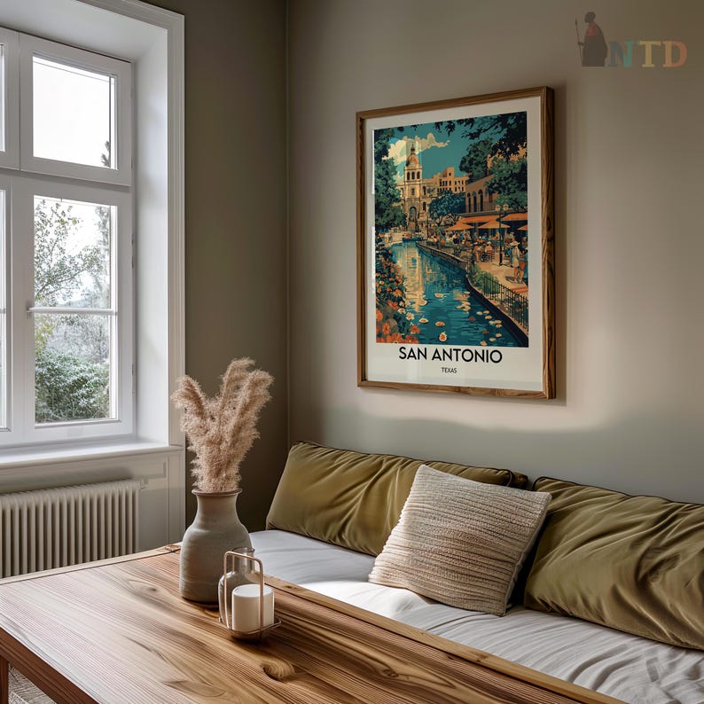 May include: A framed vintage travel poster with a colorful illustration of a cityscape with a river and the text "SAN ANTONIO, TEXAS".