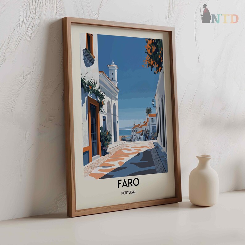 May include: A framed illustration of a street scene in Faro, Portugal. The illustration is in a modern style with a blue sky, white buildings, and orange trees. The text "Faro, Portugal" is printed at the bottom of the illustration.