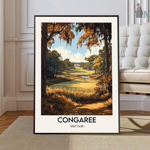 May include: A framed art print of Congaree Golf Club. The artwork depicts a golf course scene with trees, a pond, and a building in the distance. The print has a black frame and the text "CONGAREE GOLF CLUB" at the bottom.