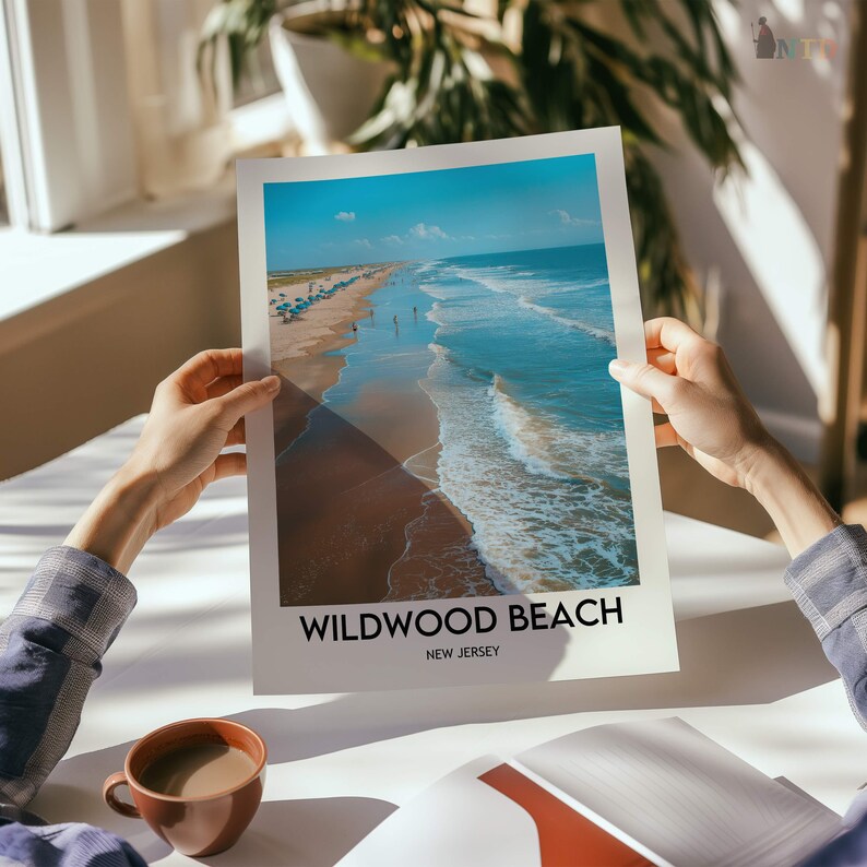 May include: A print of Wildwood Beach, New Jersey, showing an aerial view of the coastline. The image displays the ocean waves, sandy beach, and the text "Wildwood Beach" in black, with "New Jersey" underneath.