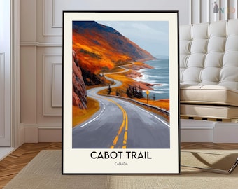 May include: A framed print featuring the Cabot Trail in Canada. The image shows a scenic coastal road with a winding path, set against a backdrop of autumn colours. The road has yellow lines, and the text "CABOT TRAIL CANADA" is displayed at the bottom.