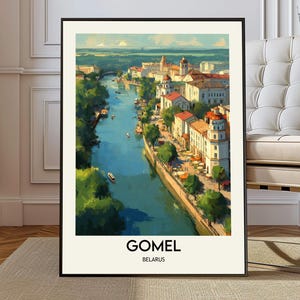 May include: A framed art print of Gomel, Belarus, featuring a watercolor-style depiction of a river flowing through a city. The artwork showcases buildings with red-tiled roofs, lush green trees, and small boats on the water. The word "GOMEL" and "BELARUS" are printed at the bottom.