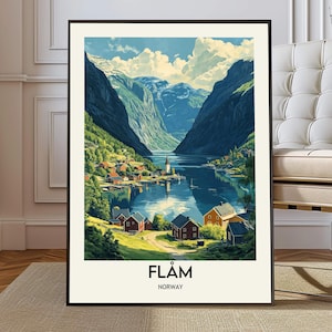 May include: A framed art print of Flåm, Norway, featuring a scenic landscape. The artwork depicts a village nestled by a fjord, surrounded by mountains and a serene lake. The print includes the text "FLÅM" and "NORWAY" at the bottom.