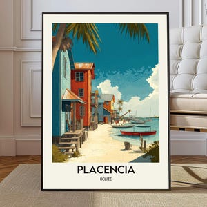 May include: A framed art print featuring a coastal scene in Placencia, Belize. The artwork depicts colorful buildings, boats, and palm trees along a sandy beach under a bright blue sky. The word "PLACENCIA" and "BELIZE" are printed at the bottom.