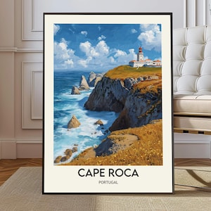 May include: A framed print of Cape Roca, Portugal, featuring a lighthouse on a cliff overlooking the ocean. The artwork showcases a vibrant blue sky with fluffy clouds, crashing waves, and the text "CAPE ROCA PORTUGAL" at the bottom.