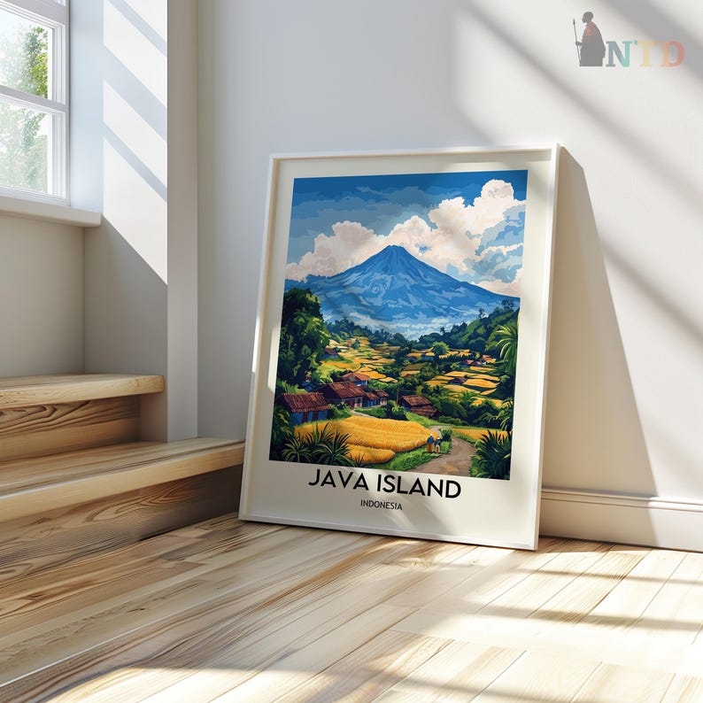 May include: Framed art print of Java Island, Indonesia. The artwork depicts a mountain landscape with a blue mountain, green trees, yellow fields, and small houses. The text "JAVA ISLAND INDONESIA" is at the bottom.