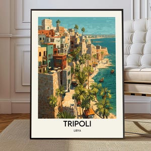 May include: A framed art print of Tripoli, Libya, featuring a coastal town with colorful buildings, palm trees, and boats on the turquoise water. The artwork has a vintage travel poster style with the city name and country at the bottom.