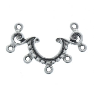 May include: Silver-toned metal jewelry clasp with a decorative design and six loops for attaching chains or cords.