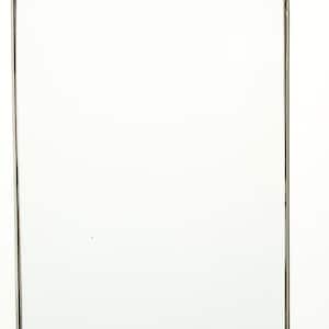 May include: A silver metal picture frame with a clear glass insert. The frame has a hanging loop at the top.