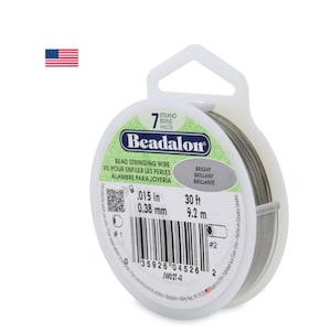 May include: A spool of 7-strand bead stringing wire, 30 feet long, with a diameter of 0.015 inches (0.38 mm). The wire is made by Beadalon and is labeled "Bright" in English, French, and Spanish.