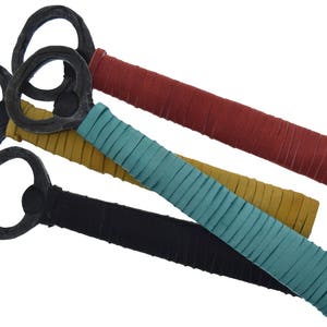 Bottle cap openers, leather wrapped sold by each