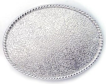 May include: A silver oval-shaped belt buckle with a textured surface and a rope-like border.