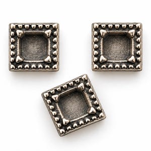 May include: Three square metal settings with a dark antique bronze finish. Each piece features a recessed center square framed by a border of small raised beads and four corner prongs designed to hold a stone or cabochon in place securely.