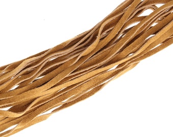 Fringe suede in saddle tan, 10 inch length with 1/2 bias at the top. sold  by foot