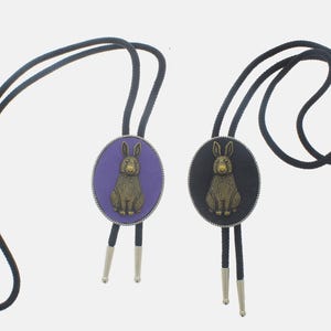 23 mm x 11 mm konijn bolo stropdassen, paars of zwart leer, gemaakt in de VS, elk