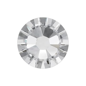 May include: A clear crystal rhinestone with a faceted design.
