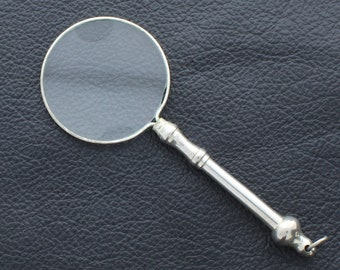 Suspension loupe finition argentée,