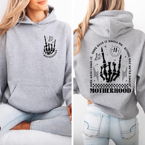Sudadera con la frase Maternidad, a veces lo rockeo, a veces me rockea, camisetas para mamás rockeras, regalo para el día de la madre, camiseta divertida para mamás, camiseta sarcástica para mamás