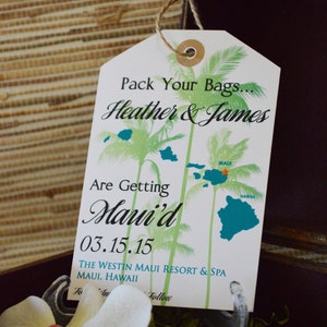 May include: A white luggage tag with green palm trees and a map of Hawaii. The text reads "Pack Your Bags... Heather & James Are Getting Maui'd 03.15.15 The Westin Maui Resort & Spa Maui, Hawaii"