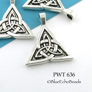May include: Three silver-toned Celtic knot triangle pendants with a textured surface. The pendants have a loop at the top for attaching to a chain or cord. The image includes the text "PWT 636 &copy;BlueEchoBeads".