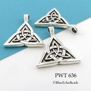 May include: Three silver triangle pendants with a Celtic knot design. The pendants have a loop at the top for attaching to a chain or cord. PWT 636 &copy;BlueEchoBeads