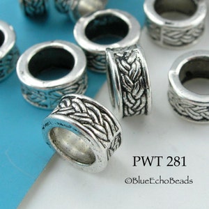 May include: Silver metal beads with a braided design. The beads are about 1 inch in diameter. PWT 281 ©BlueEchoBeads
