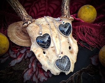 Colgante de corazón de telaraña real