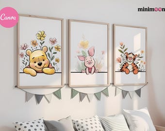 May include: Three framed art prints featuring Winnie the Pooh, Piglet, and Tigger. Each print has a white background with a character illustration and floral accents. The frames are light brown, and the prints are hung above a sofa.