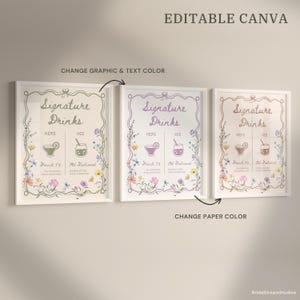 May include: Three framed prints with the text "Signature Drinks" and drink illustrations. The prints are in different color schemes, with floral accents and the text "French 75" and "Old Fashioned". The top text reads "Editable Canva".