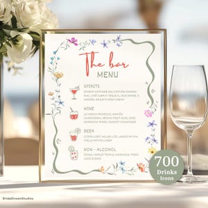 May include: A rectangular bar menu sign in a gold frame featuring the text The bar MENU in red and grey. The design includes watercolor floral illustrations in blue, pink, and yellow, along with small drink icons and lists of spirits, wine, beer, and non-alcoholic beverages.