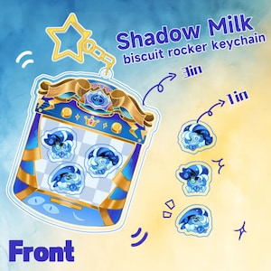 Peut inclure: Un porte-clés en acrylique bleu et or représentant un personnage de dessin animé avec une couronne. Le porte-clés est en forme de lecteur de musique et porte le texte "Shadow Milk biscuit rocker keychain" et "Front". Le porte-clés mesure 2,5 cm sur 7,5 cm.