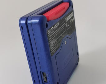 Dust cover for the cartridge slot of the Nintendo Gameboy Advance SP