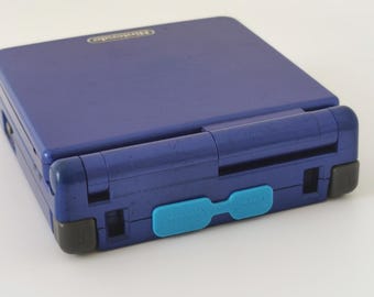 2 x Flexible dust cover for the ports of the Nintendo Gameboy Advance SP