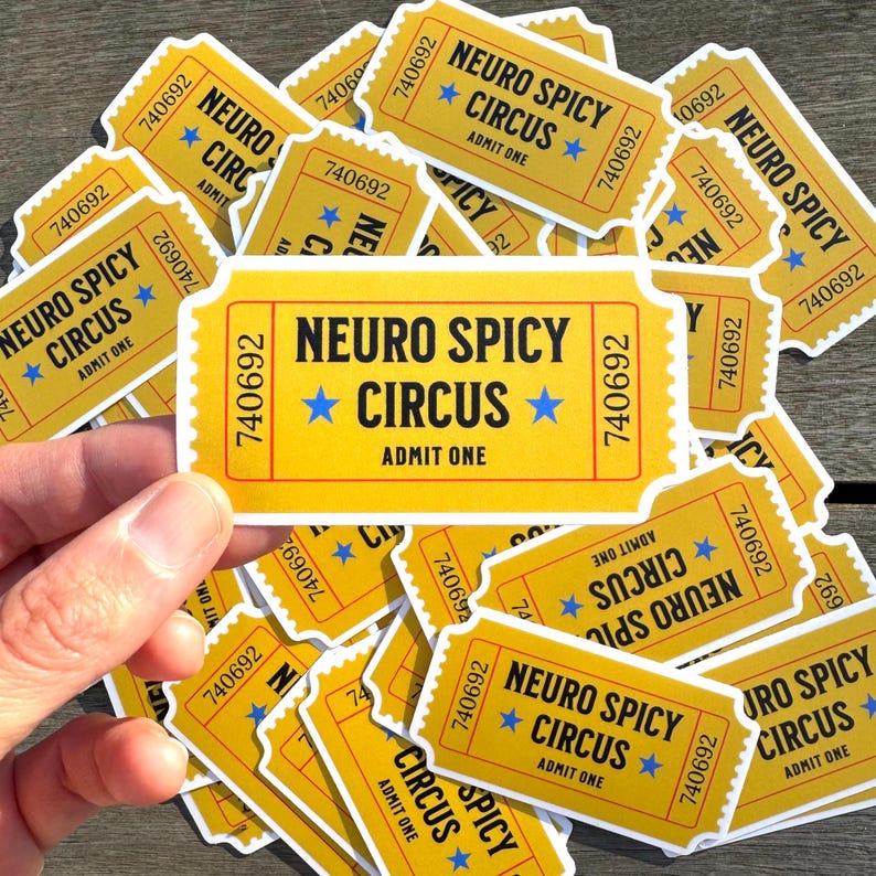 May include: A close-up of a stack of yellow paper tickets with the text "Neuro Spicy Circus" and "Admit One".
