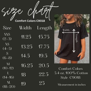 May include: A size chart for Comfort Colors C9018 t-shirts, with measurements in inches. The chart includes sizes XXS (11.25" width, 15.75" length) to XL (19" width, 25" length). A child models a black t-shirt. The shirt is 5.4 oz, 100% cotton.