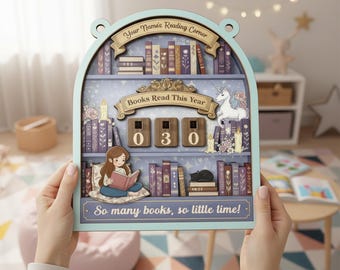 May include: A light blue wooden bookshelf-shaped reading tracker with the text "Your Name's Reading Corner" and "Books Read This Year." It features a girl reading, a unicorn, and the text "So many books, so little time!" The counter reads 030.
