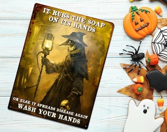 May include: A rectangular metal sign with a vintage design featuring a plague doctor holding a lantern. The sign reads "IT RUBS THE SOAP ON ITS HANDS" and "OR ELSE IT SPREADS DISEASE AGAIN WASH YOUR HANDS". Halloween-themed cookies and decorations surround the sign.