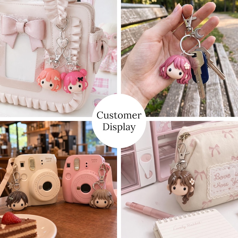 May include: A collection of character keychains featuring sculpted heads with various hair colors including pink, brown, and peach. Each keychain includes a silver-toned metal clasp, a ring, and small charms, attached to bags, cameras, and keys.