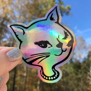 Holographic Winking Cat Sticker Reflective Rainbow Black Outline