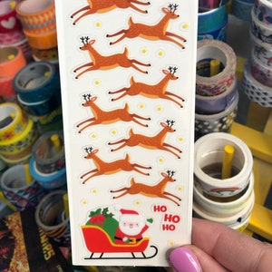 Strip of Santa Claus Sleigh and Reindeer Stickers