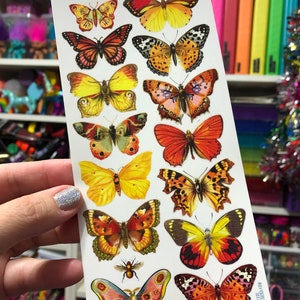 May include: A sheet of colorful butterfly stickers with a variety of designs and colors. The stickers are perfect for adding a touch of whimsy to any project.