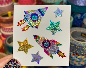 Limited Edition Sparkle Prism Rocket Ship Sticker Mrs Grossmans