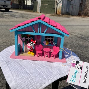 May include: A set of three ceramic mugs with a speckled, matte finish. The mugs are in shades of cream, light gray, and dark gray. Each mug has a simple, minimalist design, perfect for coffee or tea.