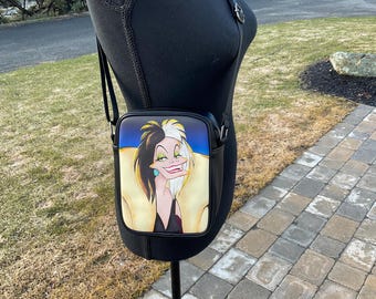 Bolso bandolera de piel sintética de Cruella