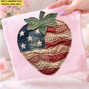 May include: A patriotic strawberry applique with a denim blue section featuring white stars and a red and white striped section. The strawberry has a green leaf and is on a pink background. The text "NOT A SEWING FILE DIGITAL PNG ONLY" is in the upper left corner.