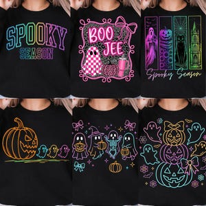 May include: A collection of six black sweatshirts featuring various Halloween-themed graphic prints in neon colors, including text like Spooky Season and Boo Jee, alongside illustrations of ghosts, pumpkins, cats, and gothic architecture.