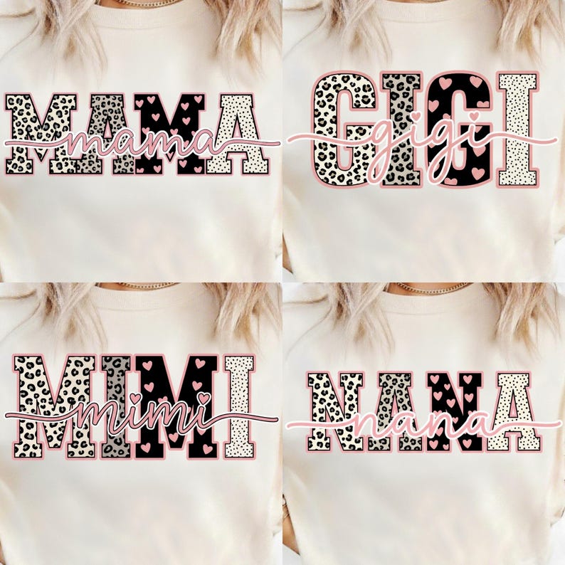 May include: Four cream-colored sweatshirts with the words "MAMA", "GIGI", "MIMI", and "NANA" printed on them. The text is in a mix of leopard print, black, and white, with pink heart accents. The sweatshirts are casual wear.