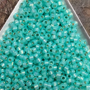 8/0 Japanese Seed Beads - Dyed Sea Green Silver Lined Alabaster - Miyuki # 571 (5&quot; round tube, approx 22 grams)