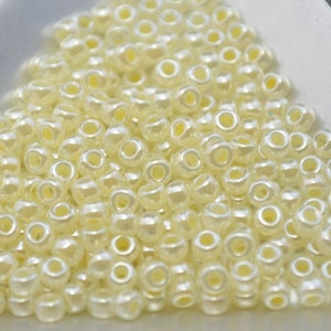 8/0 Japanese Seed Beads - Butter Cream Ceylon Miyuki # 527 (5&quot; round tube, approx 22 grams)