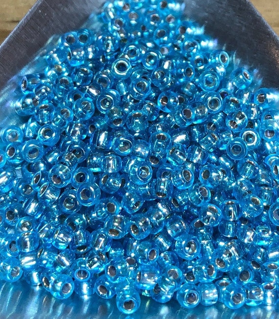 8/0 Japanese Seed Beads - Silver Lined Aqua AB Miyuki # 1018 (5 round  tube, approx 22 grams)